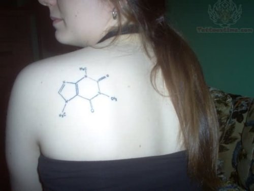 Molecule Tattoo On Girl Back Shoulder